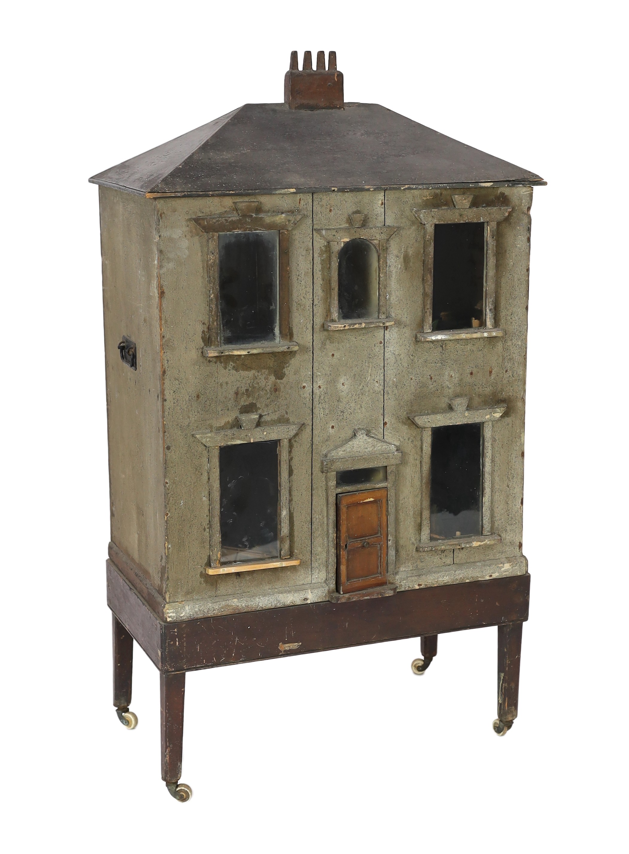 'Dunster House': A back-opening furnished dolls’ house, mid 19th century, 122cm high